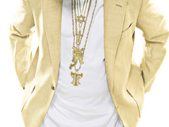 Chestshot - T-Pain in a yellow blazer, white shirt, sunglasses and wearing jewelry