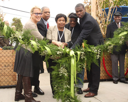50 Cent and Bette Midler cut the garland at community garden in Jamaica, Queens