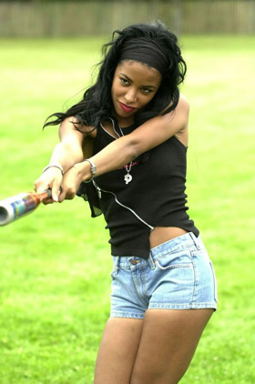 Aaliyah playing softball - single to left field