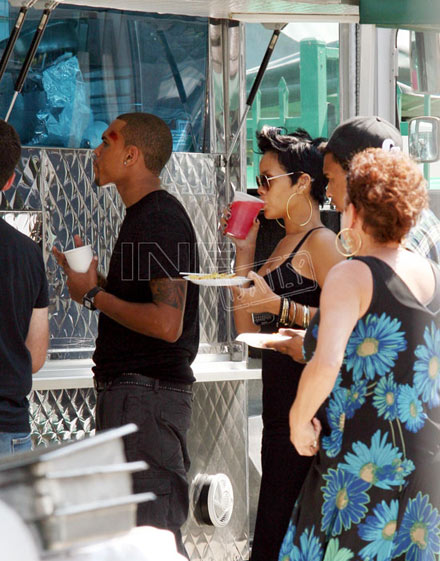Chris Brown and Rihanna get food from snack truck on Bone Deep set