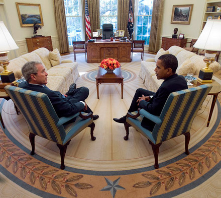 George Bush and Barack Obama chat in the Oval Office