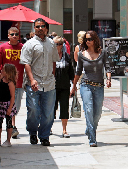 Halle Berry, mother, and nephew(?) and bodyguard leaving the movies