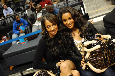 Ciara and Lala at a Hawks/Nuggets game