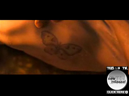 infected woman's butterfly tattoo