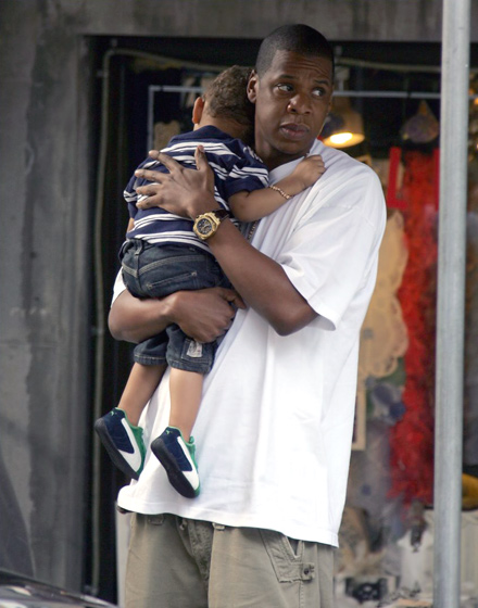 Jay-Z holding a child