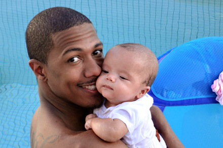 Nick Cannon in the pool with Moroccan
