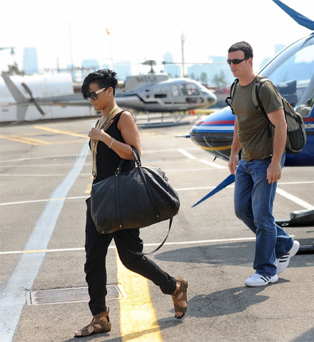 Rihanna and bodyguard gets off Liberty helicopter