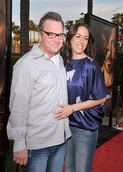 Tom Arnold in jeans and gray, plaid shirt at The Soloist premiere