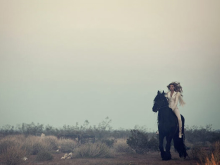 Beyonce riding on a horse