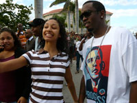 Diddy takes a picture with voter on voting line in Florida