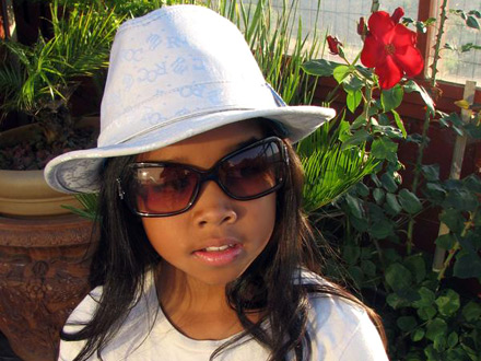 Gabi Wilson dons celeb shades and a fedora