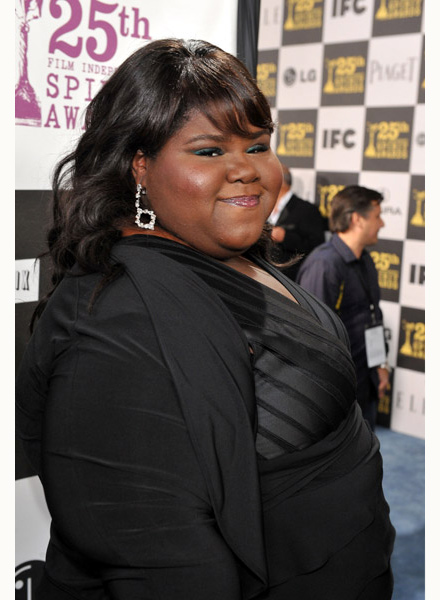 Gabourey Sidibe smiling in a black dress at the Independent Spirit awards