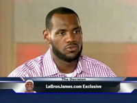 Lebron James in a striped purple shirt set for The Decision
