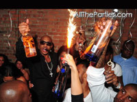 Popping bottles at Mario Winans birthday party