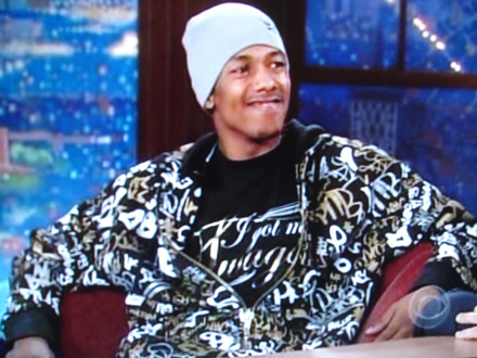 Nick Cannon gives the cheesy smile