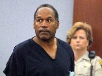 OJ Simpson in handcuffs