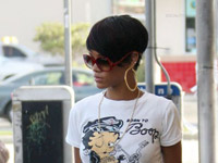 Rihanna leaves Popeyes with a soda