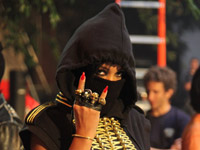 Rihanna dressed like a ninja in We Run This video shoot