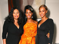 Solange Knowles with Mom and Beyonce at her 21st birthday party