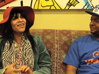 Teedra Moses smiling during BET interview with Jabari
