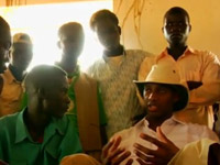 Tracy McGrady talking with Darfur refugees in 3 Points