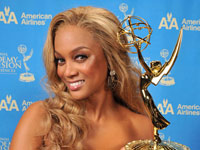 Tyra Banks smiles with her first ever 2008 Emmy Award