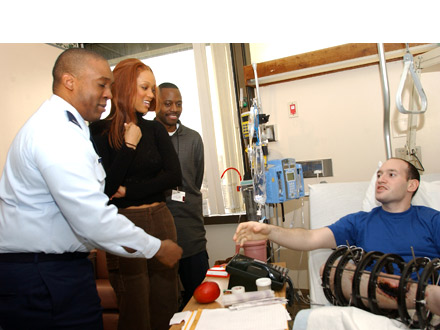 Tyra Banks and her brother Devin visit Walter Reed Medical Center